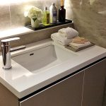 white hanex residential bathroom sink and countertop